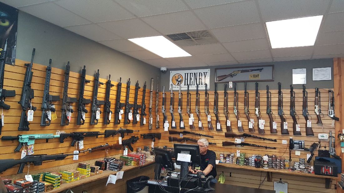 Vertical Gun Racks installed in a gun shop