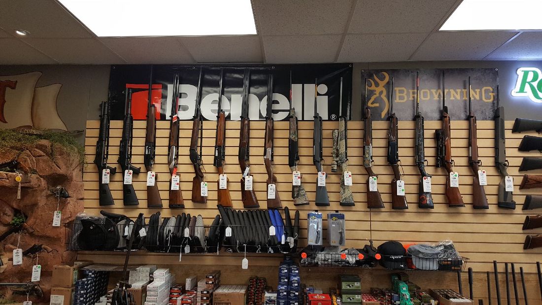 Vertical Gun Racks installed in a gun shop