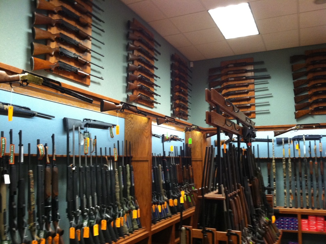 Vertical Gun Racks installed in a gun shop